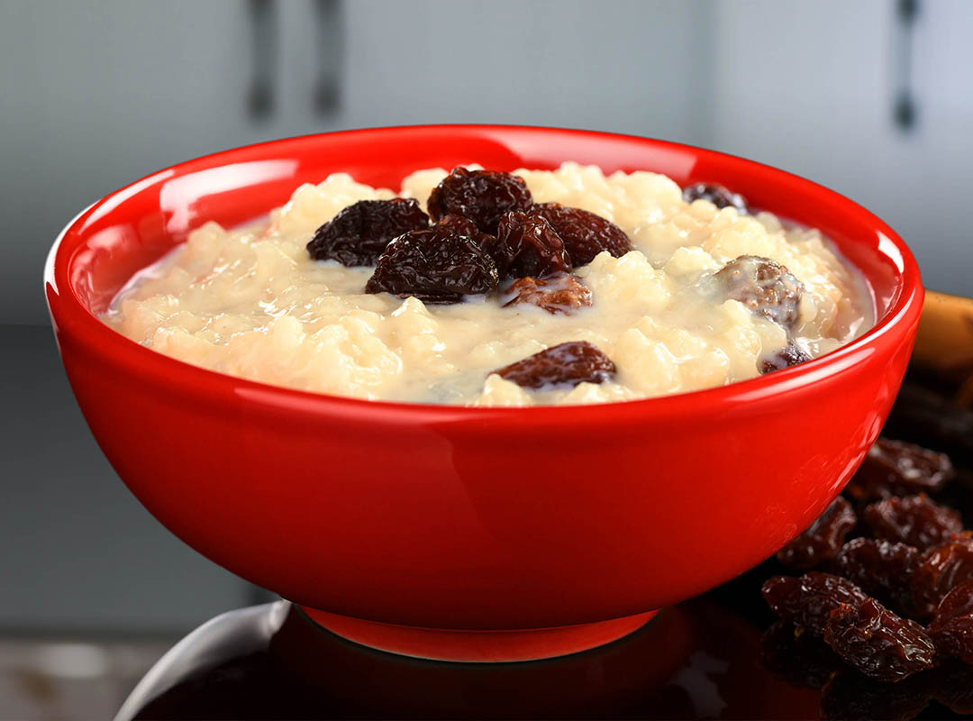 Picture of a bowl of Cauliflower Rice with Sultanas and Apple Custard