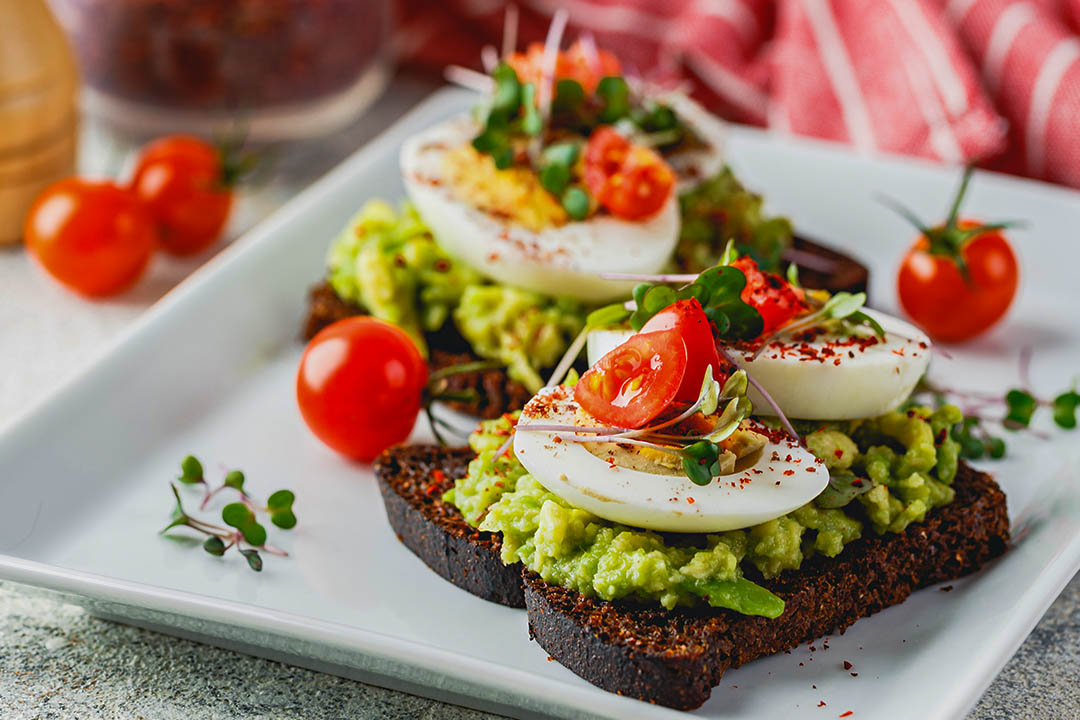 Picture of Egg on toast with sourdough avo and tomatoes
